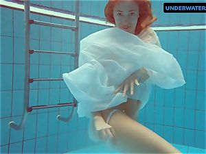 redhead Diana red-hot and insatiable in a milky dress