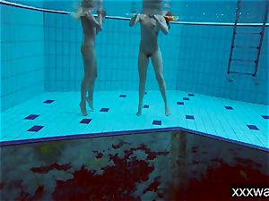 torrid Russian gals swimming in the pool